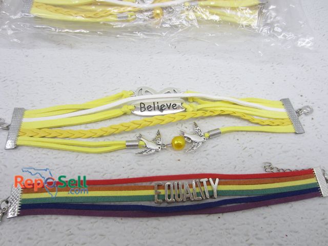 Lot 31-4484 - (24) Leather Style Charm Bracelets: Equality &amp; Believe