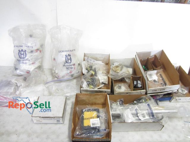 Lot 31-1350 - Genuine Husqvarna And Leonardi Spare Parts, Including Air Filters, Crankshafts, Springs, And Fuel Li...