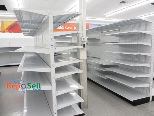 Lot 31-3066 - (2) Rows Double Sided Madix Peg Board.  Buyer Must Disassemble &amp; Remove.