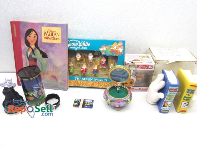 Lot 31-1328 - Disney collectibles: Ursula Watch, Mickey Bookends, Little Mermaid Music Box (Working) etc