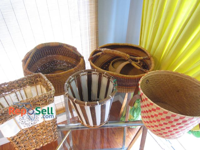 Lot 31-9008 - Seven Hand Woven Baskets With Different Patterns, Colors, And Styles; Materials Include Wicker And O...