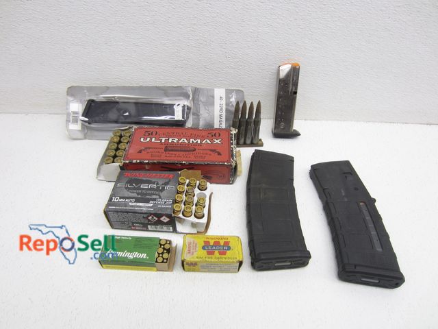 Lot 31-3401 - Firearm Clips &amp; Assorted Partial Boxes of Ammo: (2) 5.56 Mags, (1) 40 S&amp;W Mag