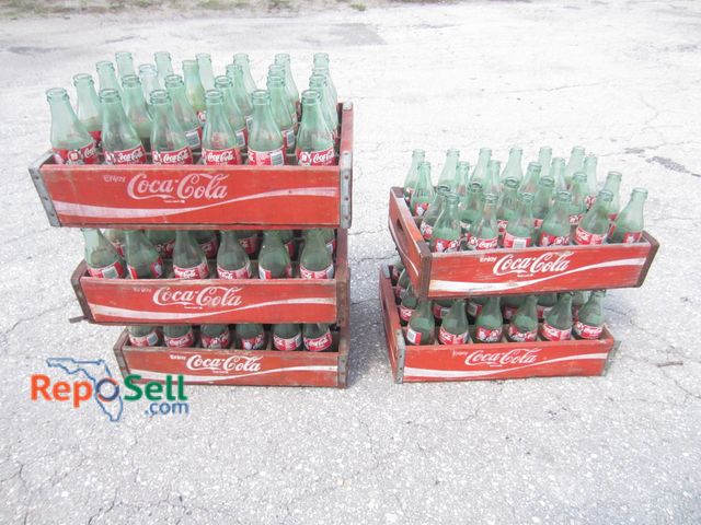 Lot 31-9093 - (Approx 120) Nascar Coca Cola Glass Bottles with Vintage Crates