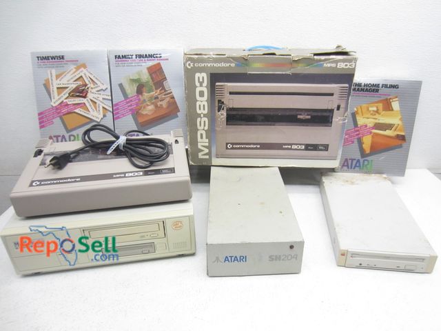 Lot 31-7120 - Lot Of Vintage Electronics: Apple (Power On), Commodore (Power On), Atari, Acces etc