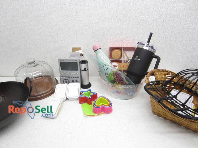 Lot 31-2366 - Estate Lot: Wok, Air Ionizers, Sony Integrated Remote, Cake Dish, etc.