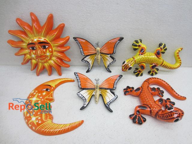 Lot 31-9431 - (6) Talavera decor pieces: lizards, butterflies, sun etc. Largest is 10 inches.