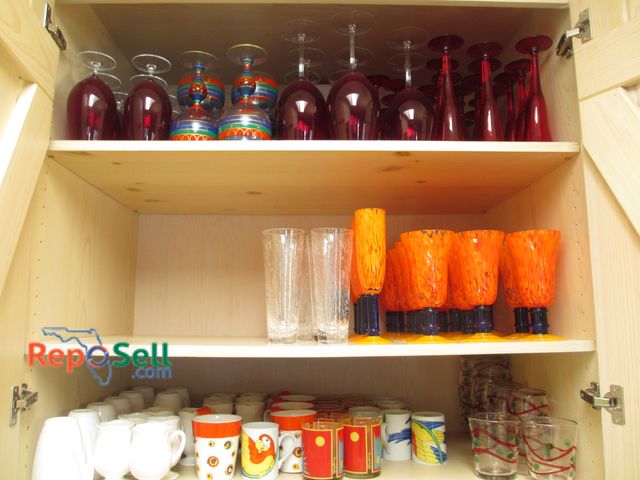 Lot 31-1184 - Large Lot of Glassware (3 Shelves Full), Plates, Cups, etc. - Bring Totes