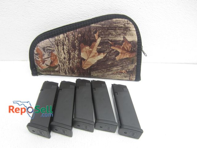 Lot 31-7266 - (5) 45 Glock 13-Round Clips And Soft Handgun Case