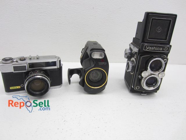 Lot 31-8608 - (3) Yashica Cameras: Yashica D 1:3.5 f=80mm,  Samurai X3.0,  Yashica M 2021056 147172 Yashinon 1:1.9