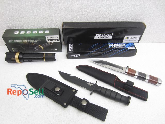 Lot 31-2310 - (1) Defender Xtreme Stun Gun/Flashlight  w/Million Voltage HV-6800, Powers On &amp; (1) Xtreme Defen...