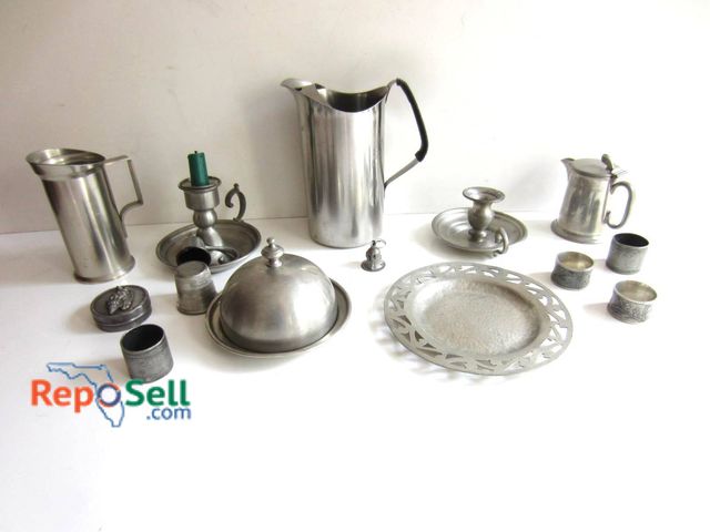 Lot 31-9151 - Metal tableware including a Cromargan-marked pitcher, a Gentry Pewter-marked piece, and additional c...