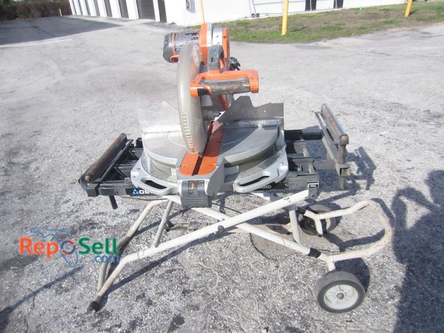 Lot 31-9201 - Ridgid 12" Compound Miter Saw #M51290LZA With Delta Stand - Power On