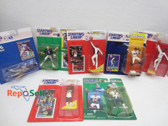 Lot 31-6391 - Approx (47) Starting Line Up Figures in Pkg 1990's - Troy Aikman, Scottie Pippen, etc. - 2 Boxes