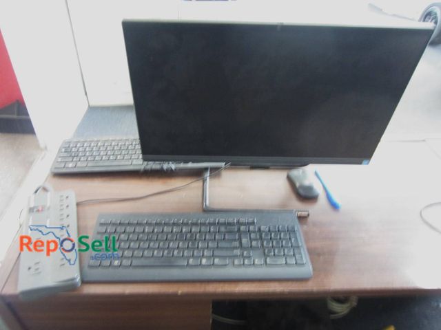Lot 31-1307 - Lenovo IdeaCentre A340-22IGM All-In-One PC With Keyboard, Mouse, And Ditek Surge Protector