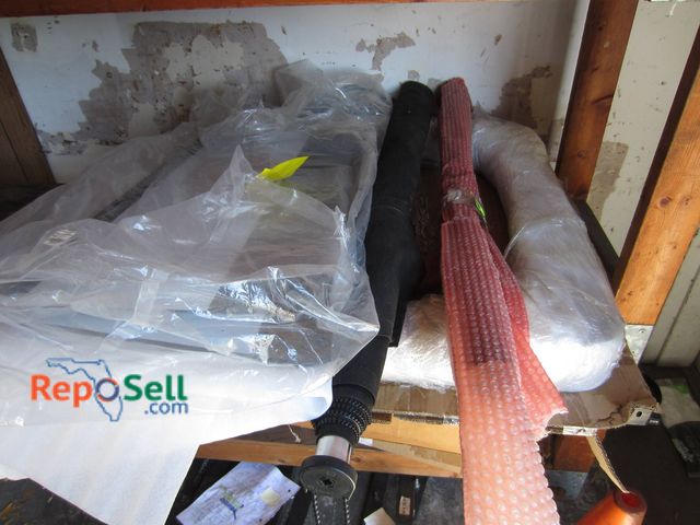 Lot 31-1081 - Golf Cart Parts Lot: EZ Go 1985 Marathon Windshield, Glass, Rear Struts Set, Assorted Parts
