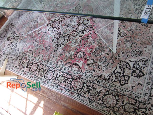 Lot 31-9115 - Persian-Style Rug With Floral Motif Featuring Pink, Black, And Beige Tones