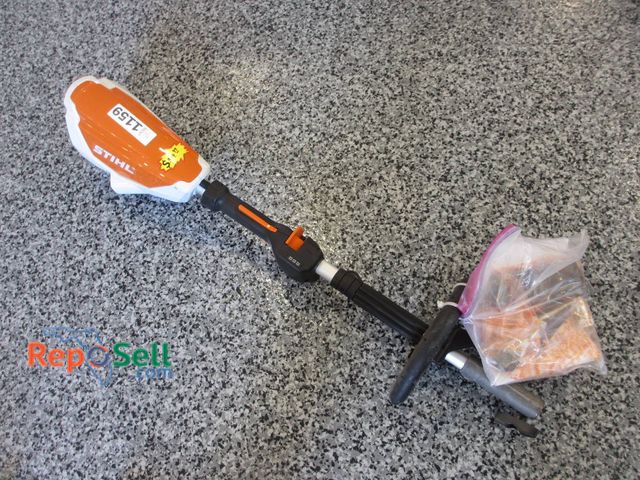 Lot 31-1159 - New Stihl KMA 130 R Power Head, featuring an orange and white color scheme with visible labeling. In...