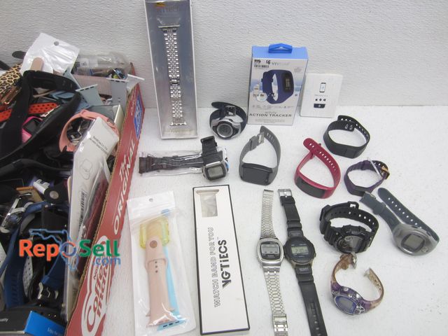 Lot 31-7305 - Lot Of Digital Watches, Watch Bands And Parts