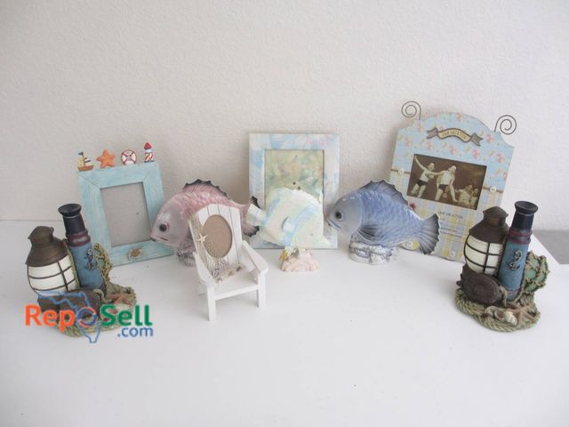 Lot 31-8526 - Nautical Decor Photo Frames, Fish Figurines, Lantern Bookends,etc