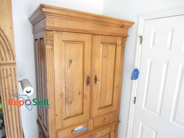 Lot 31-9198 - Wooden cabinet (No Contents)  *Please schedule pick up after 12pm*Approx 80 inches in height, 40 inc...