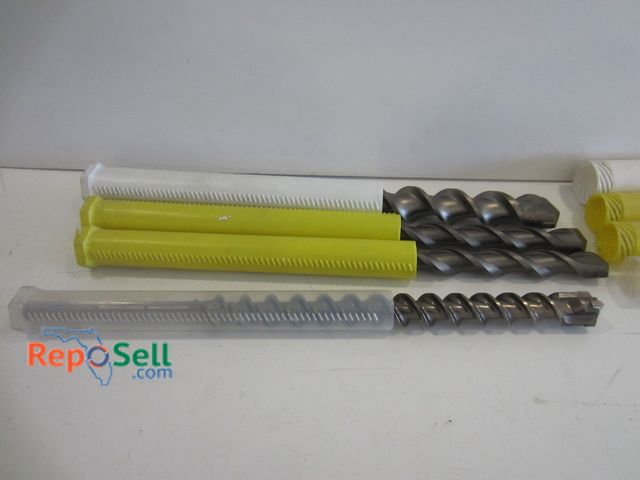 Lot 31-1213 - (4) New large drill bits: 1 1/4, 1 3/4, etc.