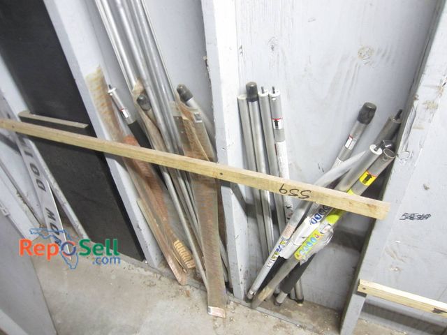 Lot 31-1272 - Stihl FS-KM Trimmer Attachments And Accessories. Includes Multiple Metal Poles, Cutting Attachments,...