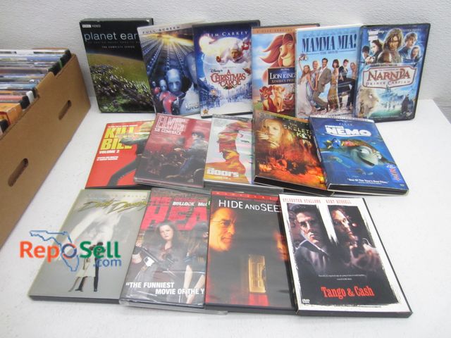 Lot 31-9547 - Approx (60) DVD's: Nemo, Narnia, I Robot, Elvis, etc.