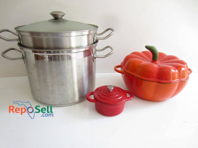 Lot 31-9174 - Cookware set including a stainless steel stock pot with a steamer insert and glass lid by Tabletops ...