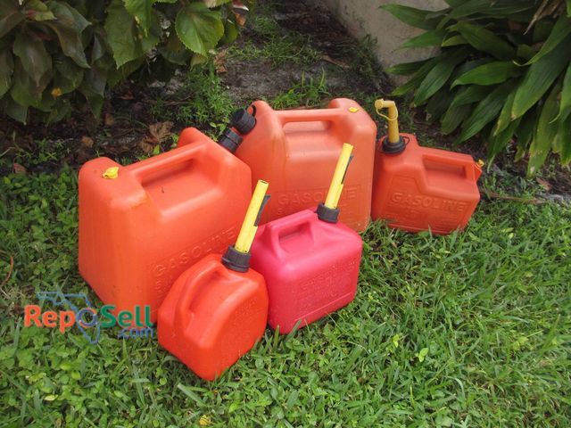 Lot 31-8375 - 5 Empty Plastic Gasoline Cans With Spouts And Handles