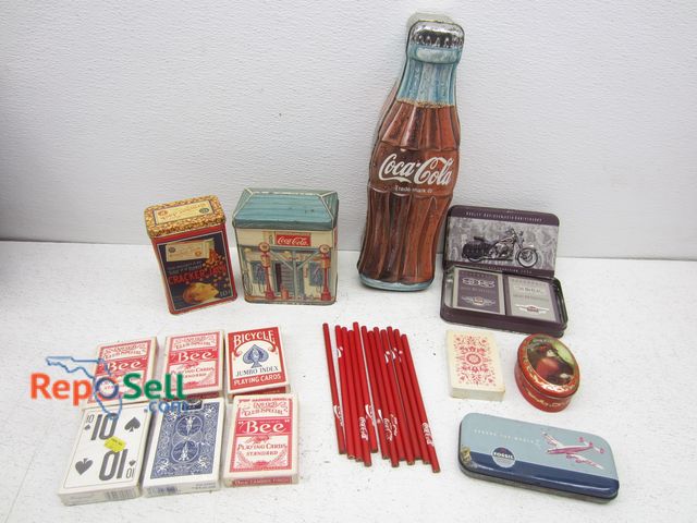 Lot 31-6366 - Vintage Coca Cola Tins, Sealed Harley Davidson Playing Cards, etc.