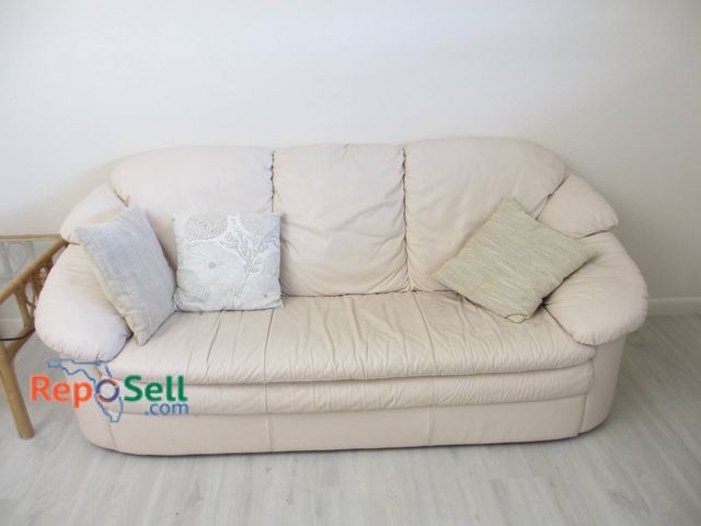 Lot 31-8507 - Beige Sofa With Pillows, Approx. 77" Wide x 37 inches high , Gently Used Condition