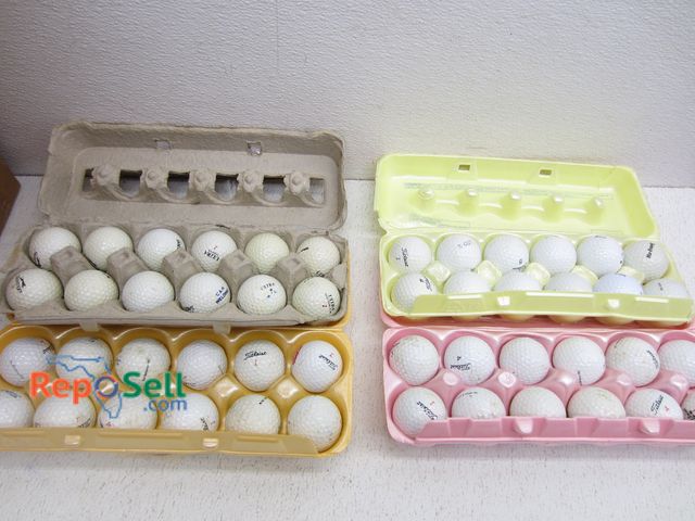 Lot 31-5111 - (11) Egg Cartons with Golf Balls