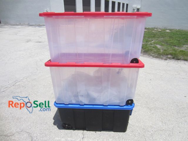 Lot 31-6252 - (3) large rolling totes with lids: (2) 77 Gallon And (1) 55 Gallon