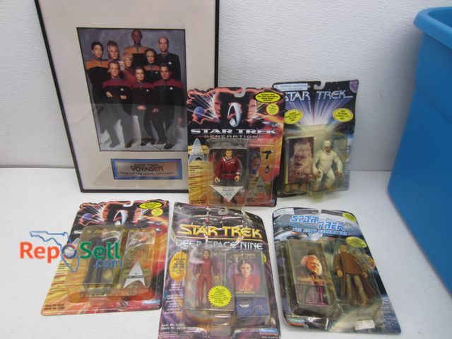 Lot 31-8359 - Star Trek Collectibles - Still Sealed: The Mugatu, Dr. Soran, Admiral Kirk, etc.