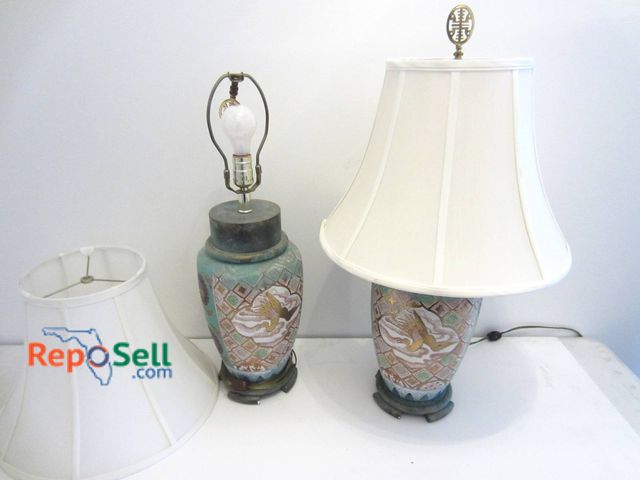 Lot 31-9057 - Two Ceramic Lamps With Painted Pattern And White Fabric Shades, Stands About 27 Inches Tall.
