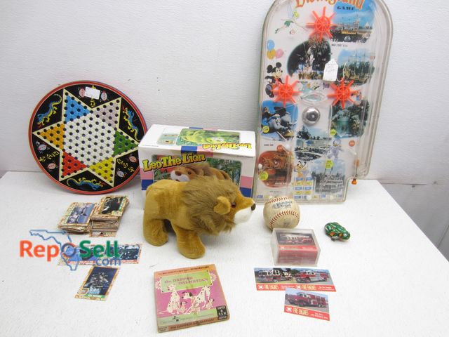 Lot 31-6115 - Vintage Toys And Collectable Cards: Leo The Lion, Disneyland F163, Desert Storm etc