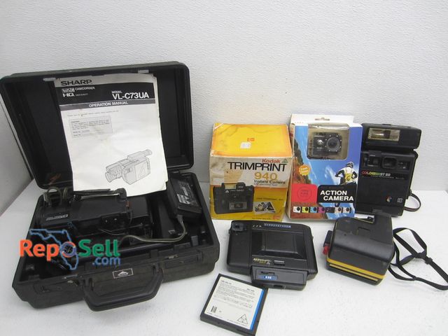 Lot 31-2425 - Camera Lot: Kodak, Polaroid, Sharp VHS, etc.