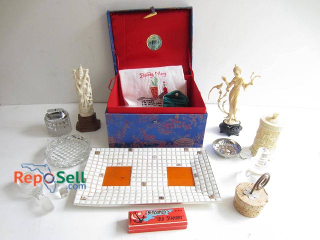 Lot 31-9301 - Collection includes a blue fabric-covered box with red interior, a female figurine on a black stand,...