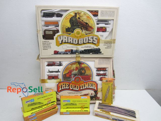 Lot 31-6298 - Train Collectible Lot in Boxes: Yard Boss, The Old Timer, Remotes, etc.