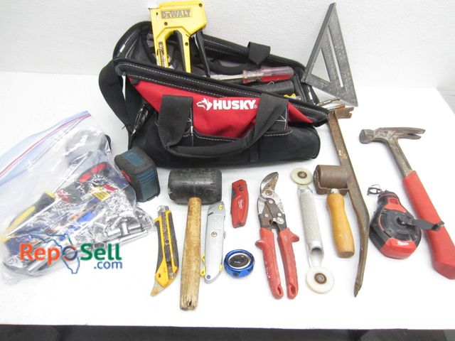 Lot 31-1127 - A lot of Hand Tools and Husky Bag: laser level, wrenches, hammers, sockets, etc.