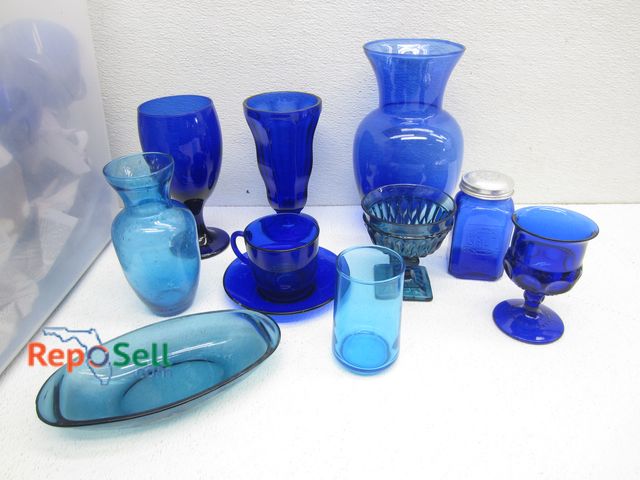 Lot 31-8270 - (62) Piece Collection Of Vintage Blue Glass Plates, Wine Glasses, Vases etc With 66 Quart Tote Inclu...