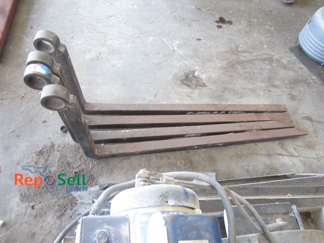 Lot 31-1040 - (4) Tractor/front end loader forks, 4 ft long