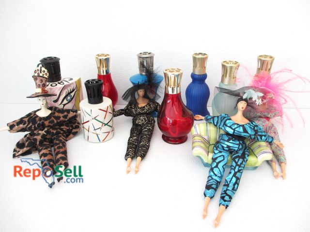 Lot 31-1483 - (4) Pougies Ceramic Dolls By Isabelle, Ceramic Couch  and (8) Fragrance Lamp diffuser Bottles Mostly...
