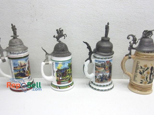 Lot 31-9425 - (4) German Steins with Lids
