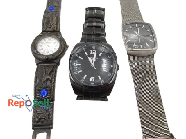 Lot 31-1004 - (3) Men's Watches (All Running): Skagen Titanium Day/Date, Swiss Gruen and Rare Magique by Helbros w...
