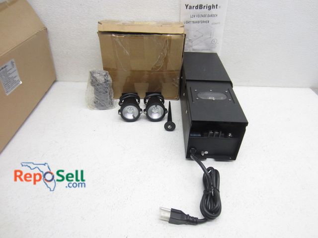 Lot 31-9409 - YardBright 600w low voltage light transformer &amp; (7) landscape lights, all appear new, transforme...