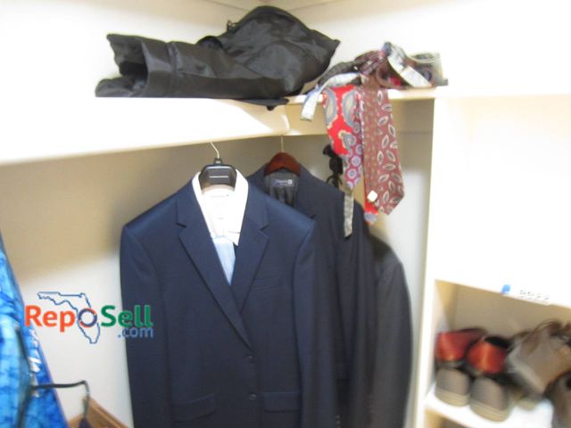 Lot 31-8623 - Men's Suit And Tie Lot: Saddlebred, Lanvin, Assorted Ties, Garment Bag (2 Suits & (1) Suitcoat)