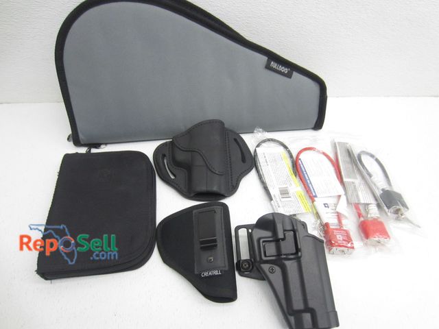 Lot 31-6110 - Gun Holsters And Acces