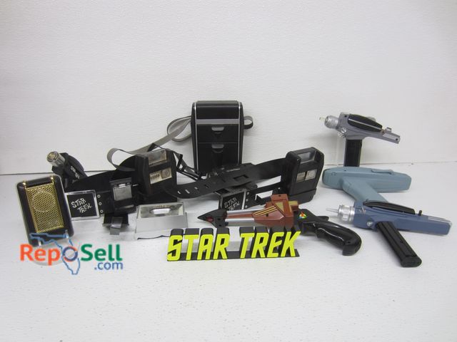 Lot 31-1230 - Assorted Star Trek Toys and Cosplay Accessories: phasers, communicator, etc.