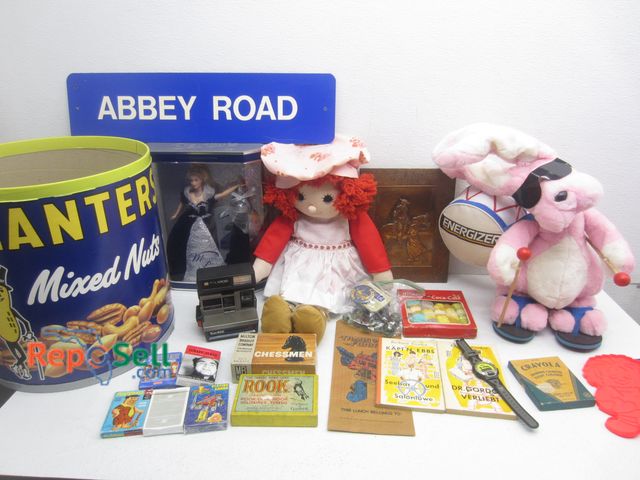 Lot 31-9346 - Vintage Booth Lot: Barbie, Abbey Road Sign, Planters, Energizer Bunny, etc.